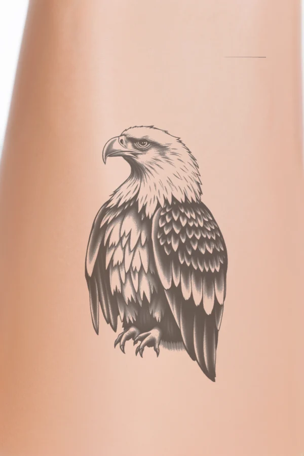 A detailed black and white temporary temporary tattoo design featuring a majestic eagle with its wings fully spread. The eagle's head is turned to the left, and it gazes in that direction. Its body showcases intricate patterns and textures, enhancing its realism. The eagle