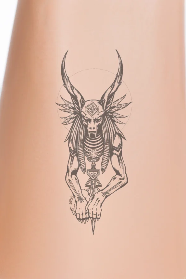 Stylized black and white temporary temporary tattoo illustration of a horned creature with a long, pointed nose. The creature features intricate patterns on its face, including geometric shapes and stylized eyes. Adorned with a crown-like headdress, its arms are