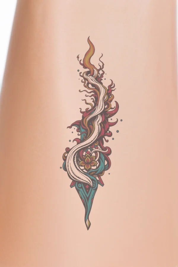 A vibrant temporary temporary tattoo featuring a stylized flame in shades of orange, red, and white. The flame has a dynamic, elongated shape that tapers to a point, surrounded by swirling patterns of red, orange, blue, and teal, suggesting movement