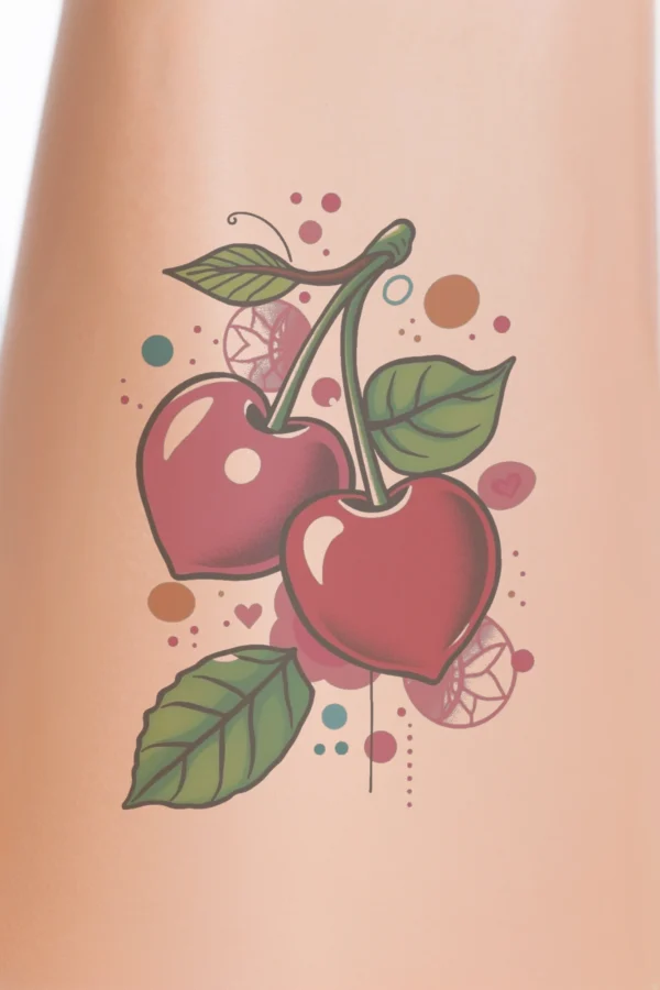 A vibrant temporary temporary tattoo illustration featuring two heart-shaped cherries in shades of pink and red, each with a glossy finish. The cherries are positioned on either side, with dark red stems extending upwards. Surrounding them are colorful elements, including a green leaf,