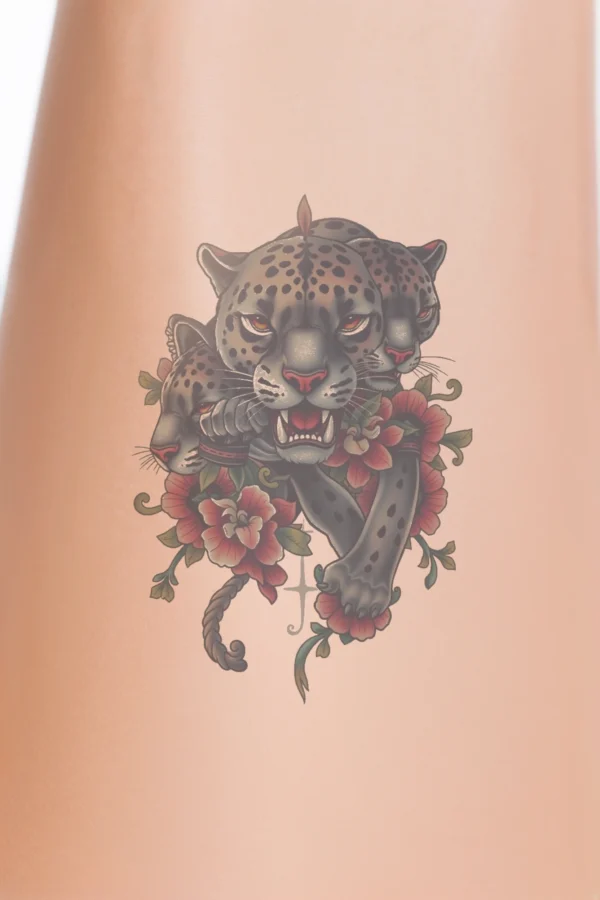 A temporary temporary tattoo design featuring a stylized jaguar in a dynamic pose, with its front legs extended and head turned to the left. The jaguar has a majestic appearance, depicted in shades of gray and black, accented with vivid red and orange highlights