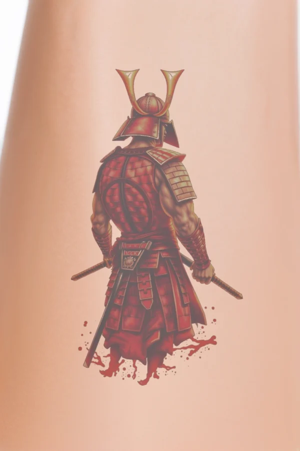 A dynamic temporary temporary tattoo design featuring a Japanese warrior in traditional red and gold armor, with a red helmet and gold visor. The warrior stands in a powerful pose, facing away from the viewer, holding swords in both hands. The striking red and gold kim