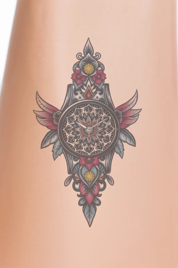 A temporary temporary tattoo design featuring a fantastical creature with a horse-like body and large, spread wings. The creature has a dark mane and tail, with its body mainly in shades of gray and darker tones. Its wings are vividly decorated in orange and red