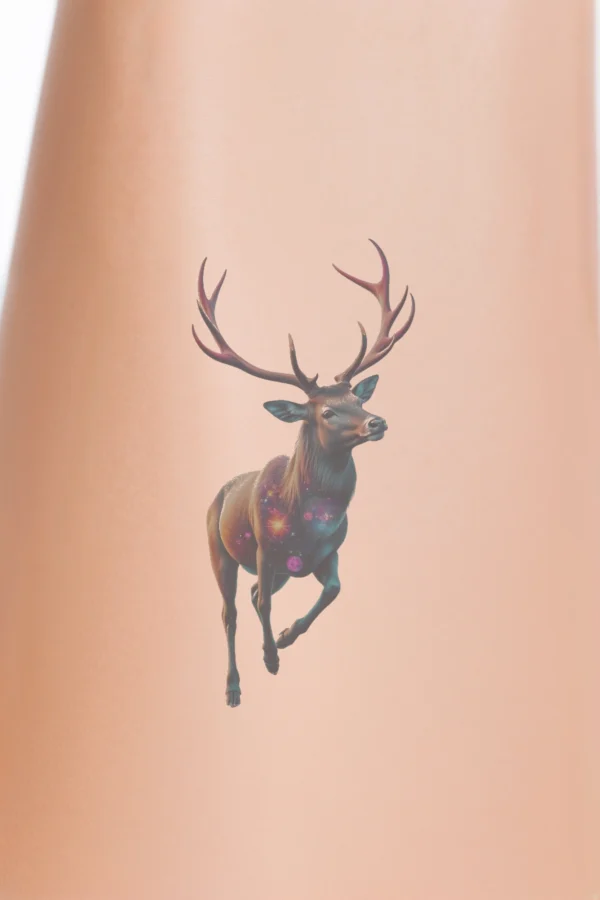 A vibrant temporary temporary tattoo featuring a majestic deer in mid-stride, showcasing a cosmic design of blended colors—blue, purple, and pink—reminiscent of a nebula. The deer, with its head turned to the left and prominent ant