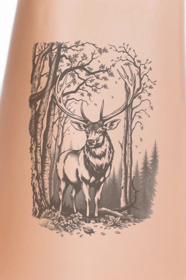 A detailed black and white temporary temporary tattoo design featuring a majestic deer with large antlers, standing in a dense forest. The deer faces the viewer, showcasing its textured coat with contrasting dark and light shades. Surrounding the deer are intricately rendered deciduous