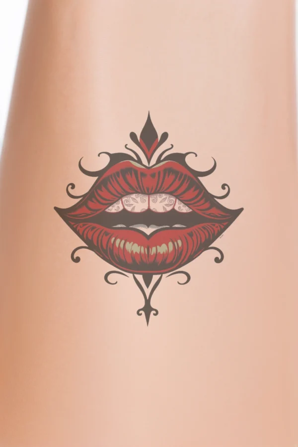 A striking temporary temporary tattoo design featuring a pair of open lips in vibrant red and black. The lips, adorned with intricate black patterns, reveal a soft pink interior and are centrally positioned against a stark white background, which enhances their bold colors. Slightly tilted