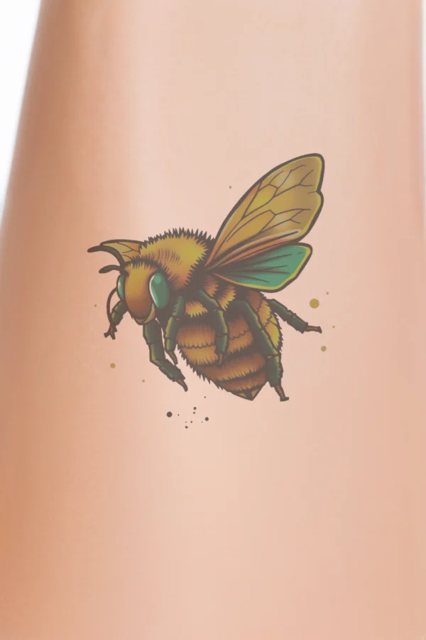 Colorful temporary temporary tattoo design featuring a vibrant bee in flight. The bee's body is primarily orange, with a yellow abdomen and green thorax. Its wings display bold yellow with orange and yellow stripes, while its head is light green and legs are dark