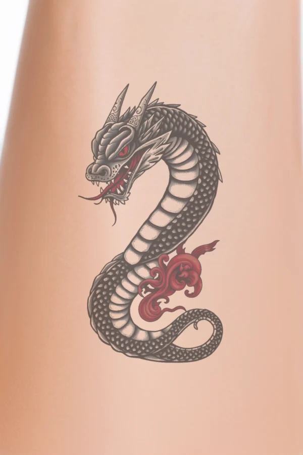"Temporary temporary tattoo featuring a stylized dragon with a predominantly black body and striking red accents on its head, neck, and tail. The dragon's menacing open mouth reveals sharp teeth, and its dark red tongue contrasts with its bright red eyes. The