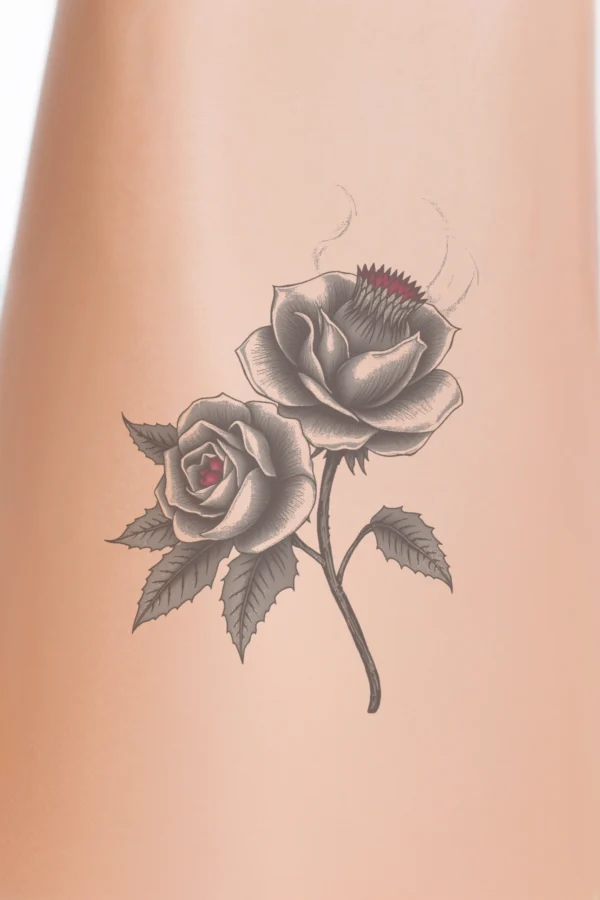 A temporary temporary tattoo design featuring a striking mask inspired by East Asian art. The mask has a white and black color scheme, characterized by a prominent pointed nose and a wide, menacing grin. Its eyes are a vivid orange, while the mouth is a