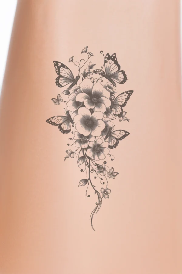 A detailed black and white temporary temporary tattoo featuring a cascading floral arrangement. The design includes a cluster of various flowers, such as dark-colored hydrangeas and lighter daisies, arranged in a natural, flowing style. The flowers vary in size and position,