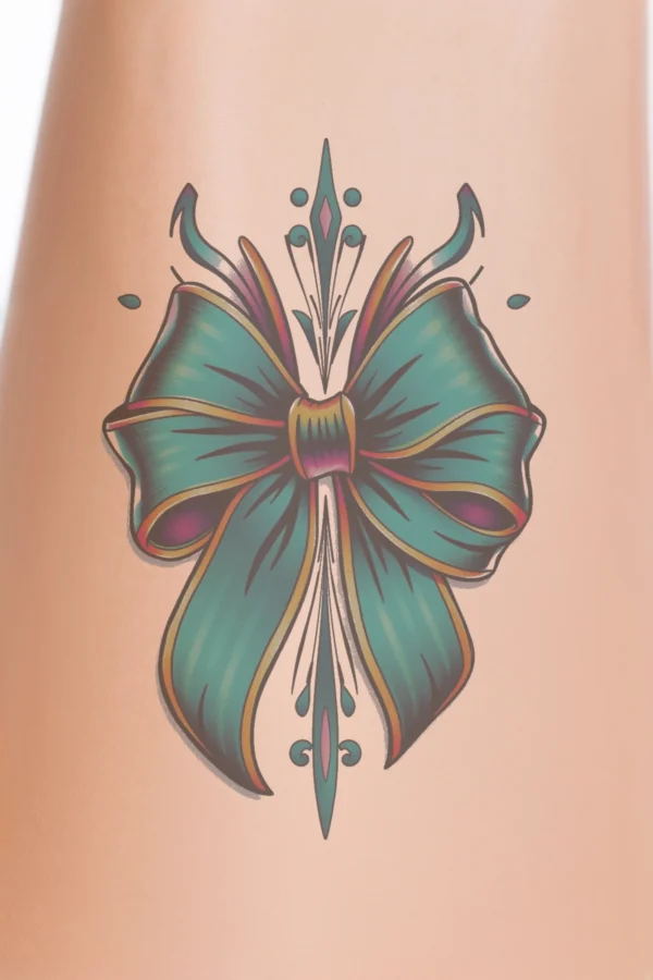 A large, symmetrical temporary temporary tattoo design featuring a vibrant teal bow with deep blue-green tones, adorned with bold orange and yellow stripes. The bow is centrally positioned against a stark white background, highlighting its intricate details and vivid colors.