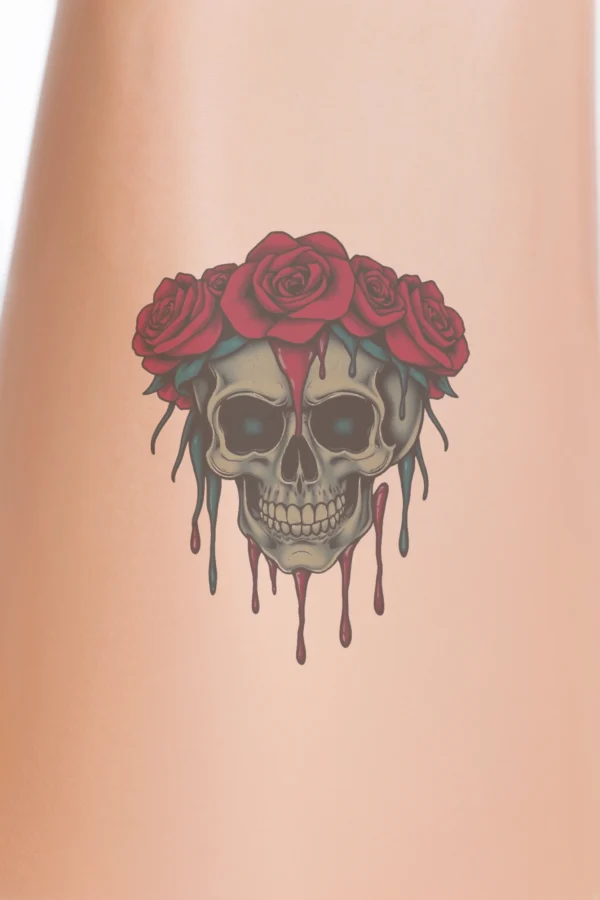 A realistic illustration of a light beige skull with an open eye and slightly parted mouth, giving a surprised expression. The skull is crowned with a circular arrangement of vibrant red roses with detailed petals and green leaves. The background is white, highlighting the skull and