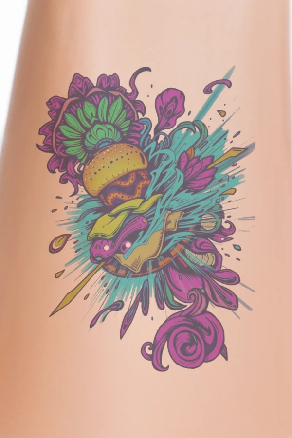 A vibrant pop art-style temporary temporary tattoo featuring a cartoonish burger at its center, complete with a bun, patty, lettuce, tomato, and cheese. The burger is set against a white background, enhancing its bold colors. Surrounding the burger are